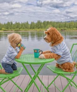 Boy Drinking Coffee With His Puppy Pa